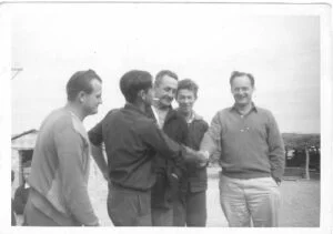 The day that Donald broke the record on Lake eyre. Photo taken at Muloorina Station left to right Joe Langford, Bruce Gloede, Alf Merlins, Terry Collins and Sir Donald Cambell.